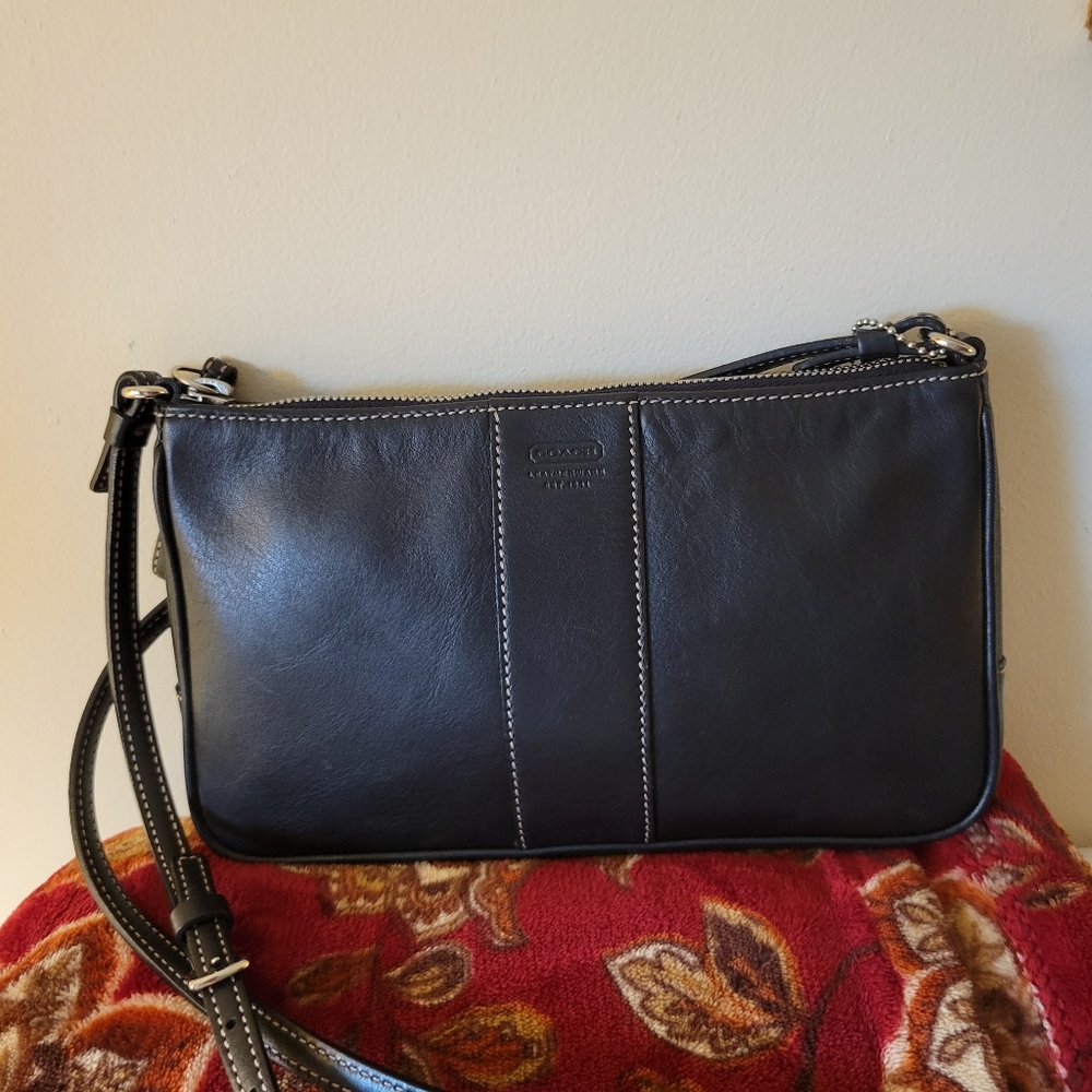 Coach slim Demi in black leather.